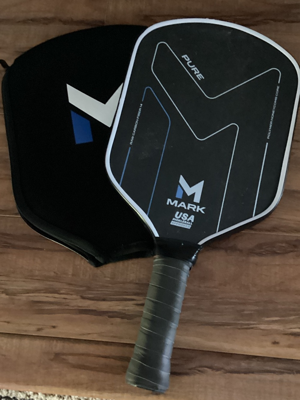 mark. Pure Pickleball Paddle in Black, Blue and White